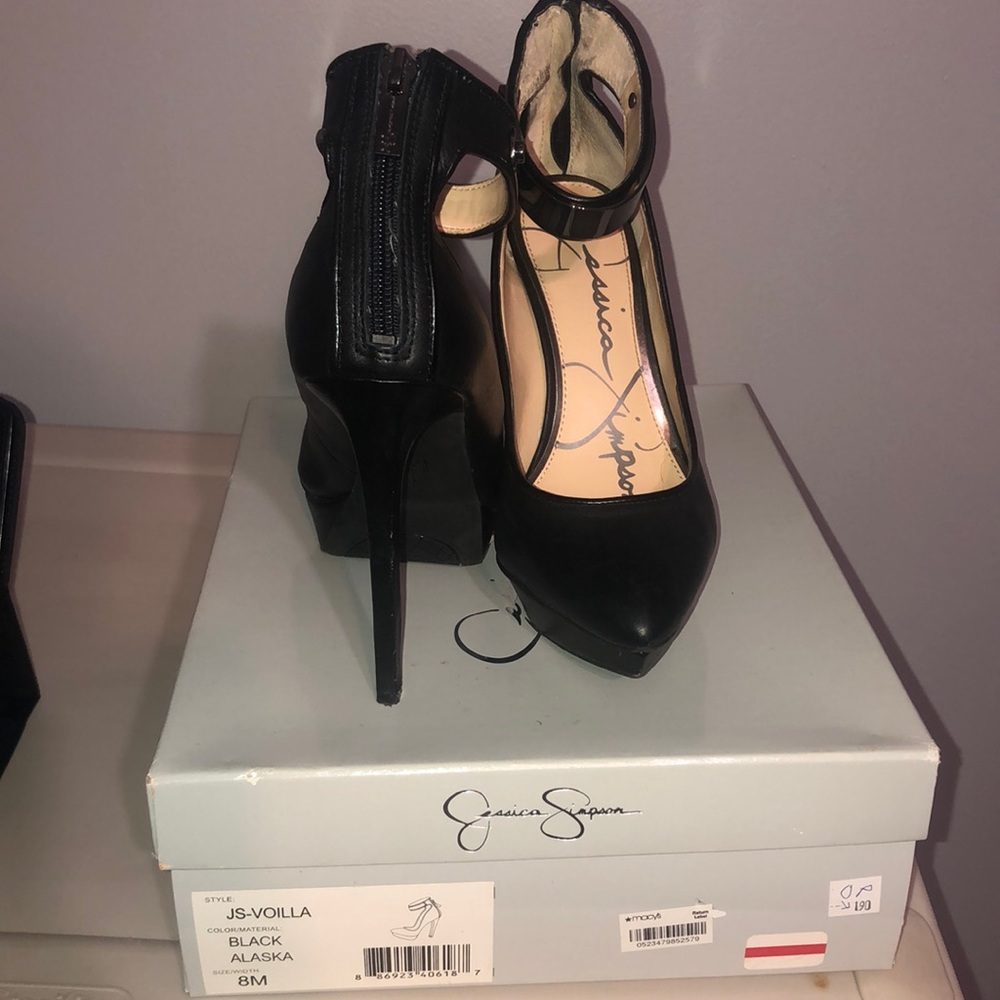 Black leather Jessica Simpson platform shoes.